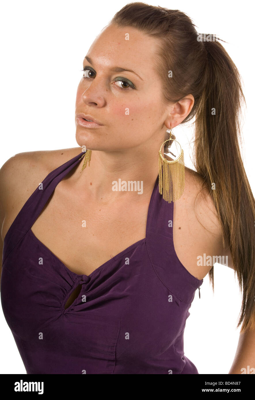 Attractive young woman purple dress isolated white Stock Photo - Alamy