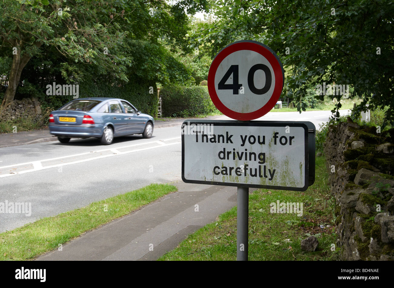 Speed limit sign with thank you for driving carefully notice Stock Photo