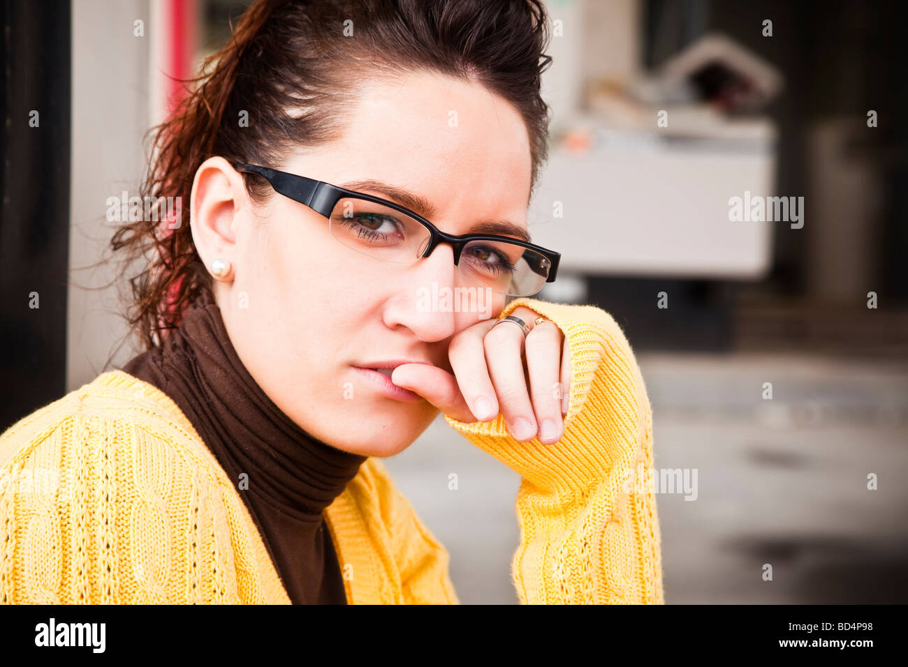 Young serious woman portrait staring at camera Stock Photo