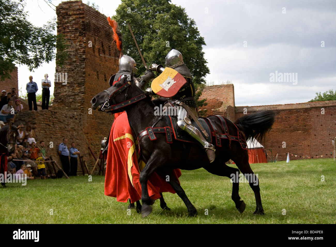 Medieval Cavalry Knights On Military Horses Fighting With Swords Taken
