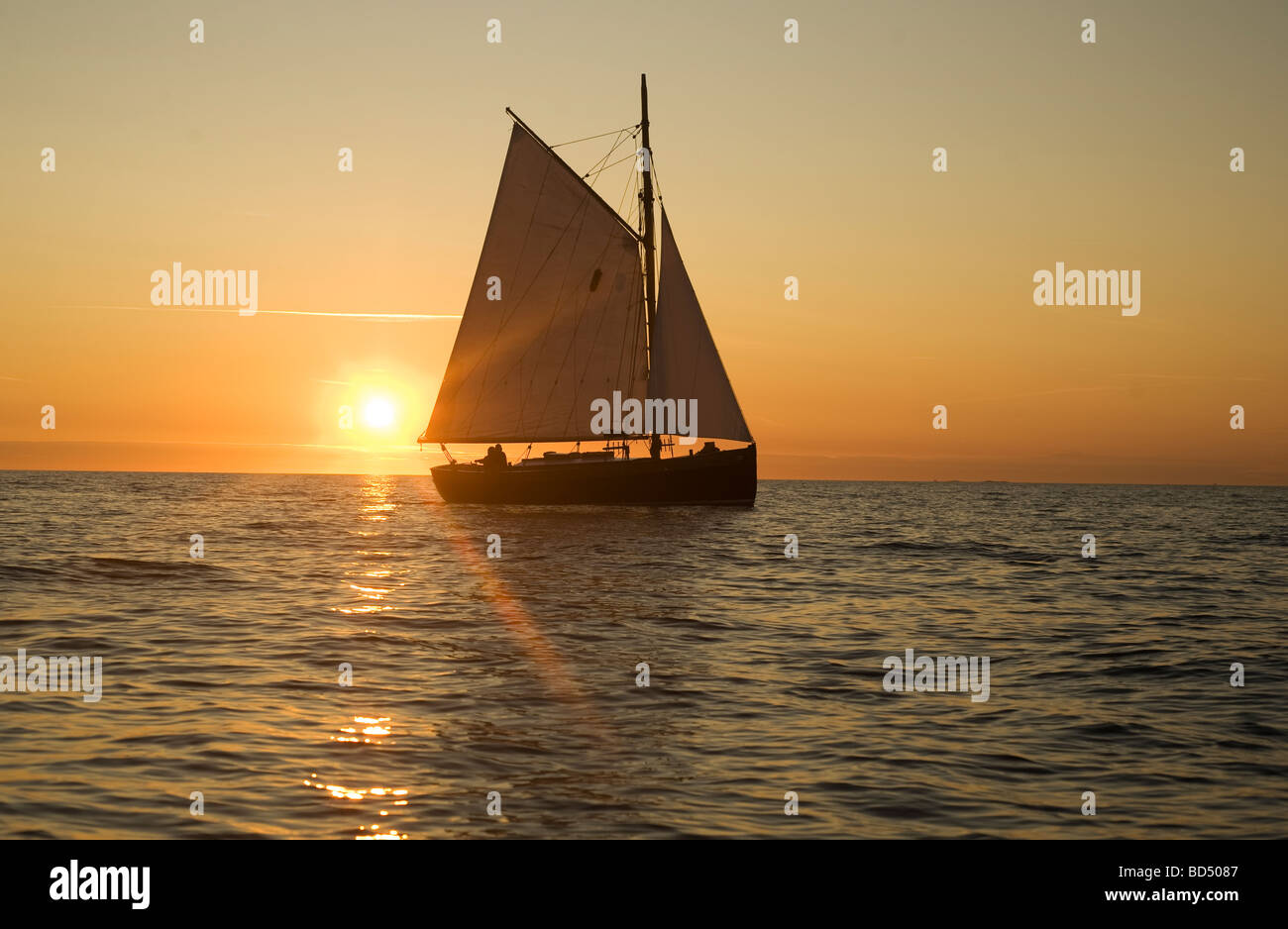 Old ship sailing in sunset, Kattegatt, Sweden Stock Photo