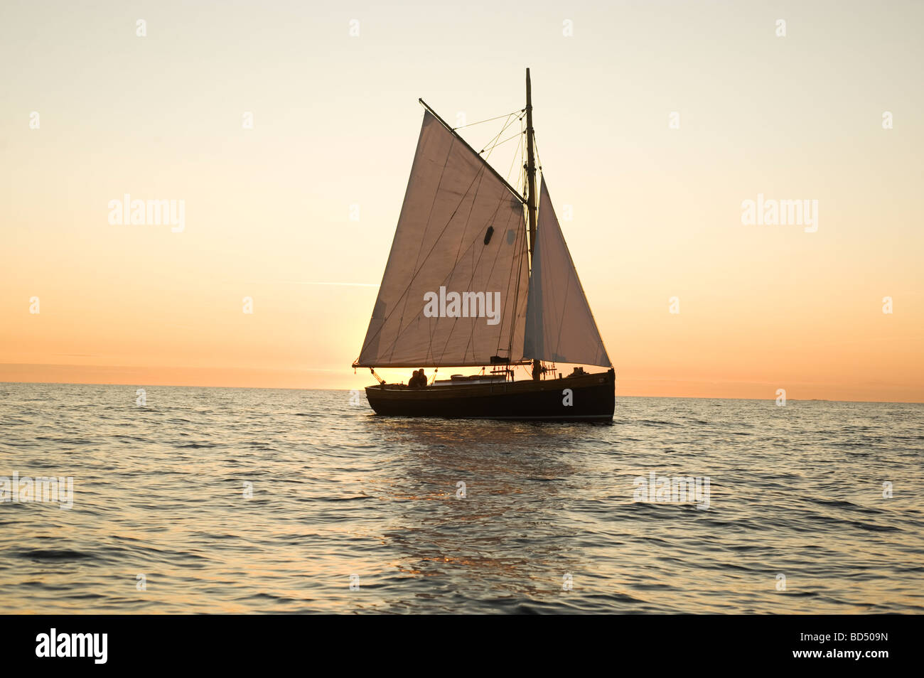 Old ship sailing in sunset, Kattegatt, Sweden Stock Photo