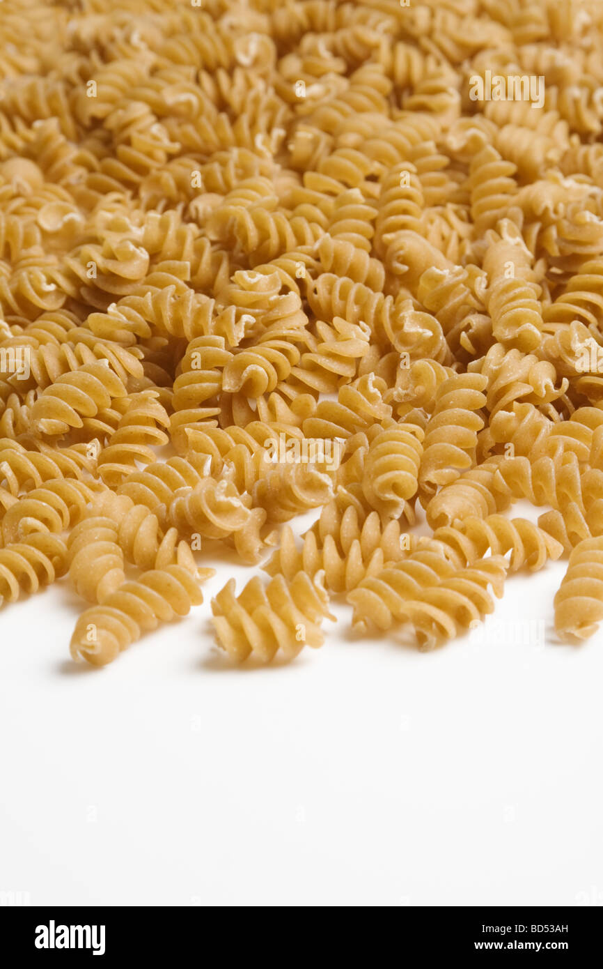 An inviting pile of dry whole wheat fusilli pasta begging to be cooked
