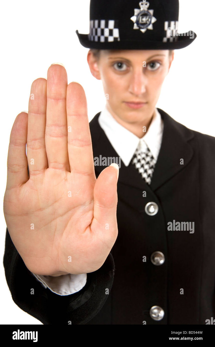 Police woman indicating STOP isolated on white Stock Photo