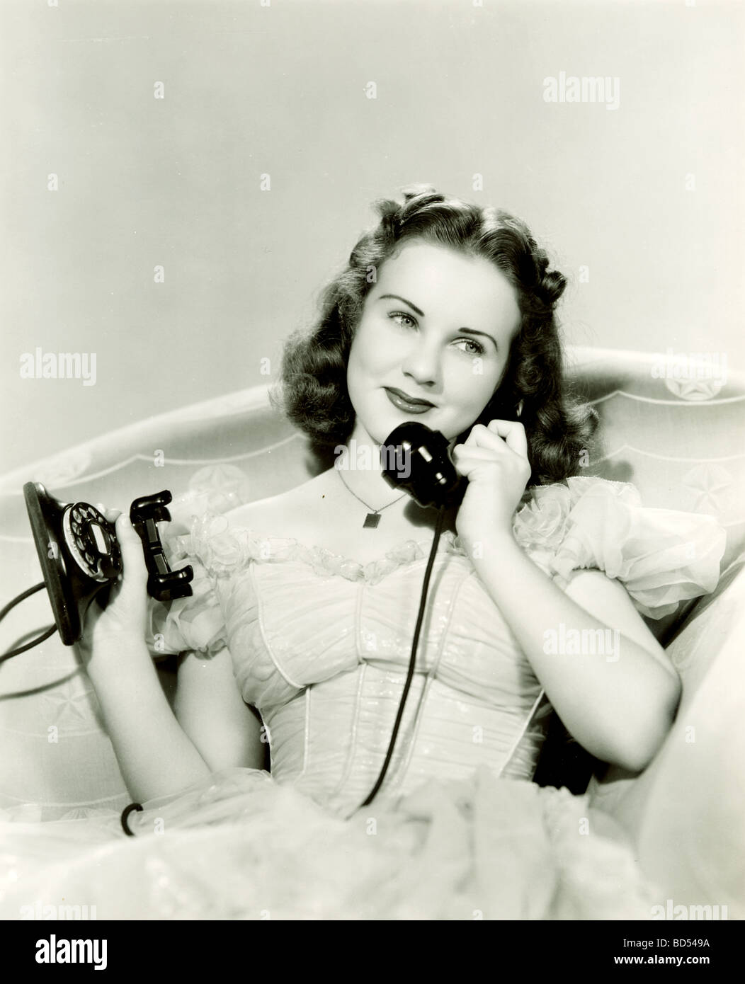 Debutante on the Telephone Stock Photo