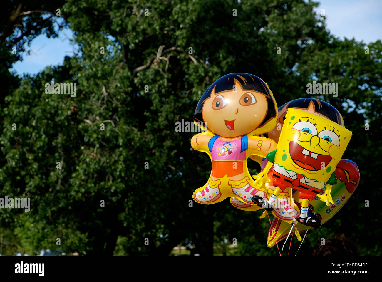 Dora the explorer and Sponge Bob helium balloons Stock Photo
