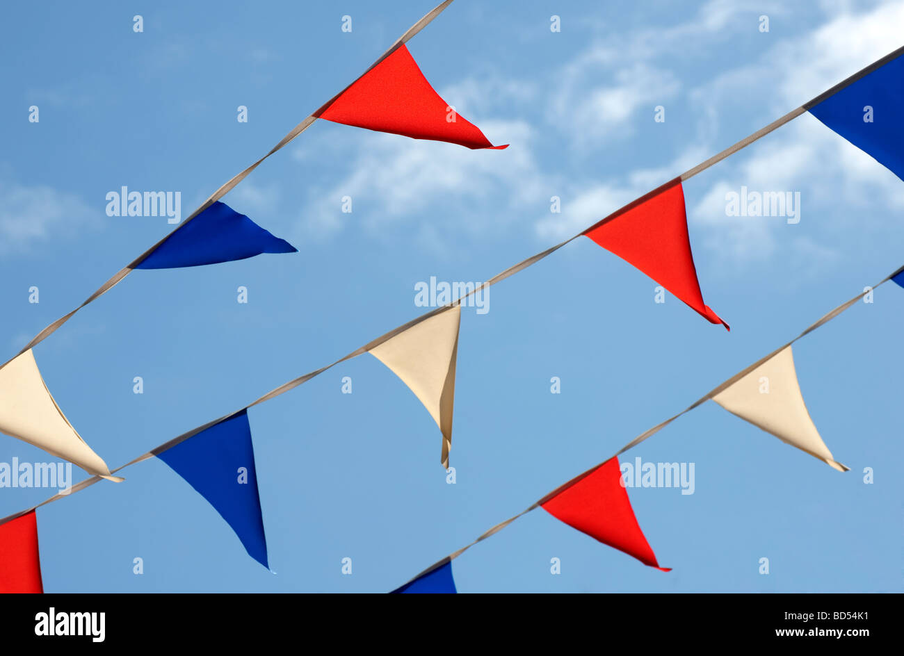 Red white and blue bunting against blue sky Stock Photo