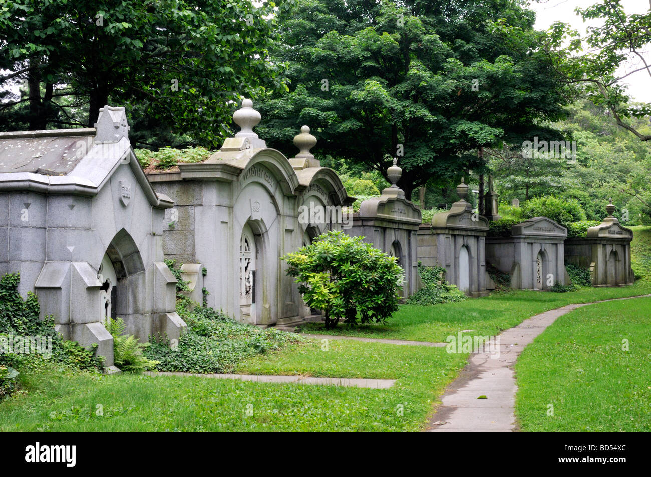 Row of old mausoleums in cemetery Stock Photo Alamy