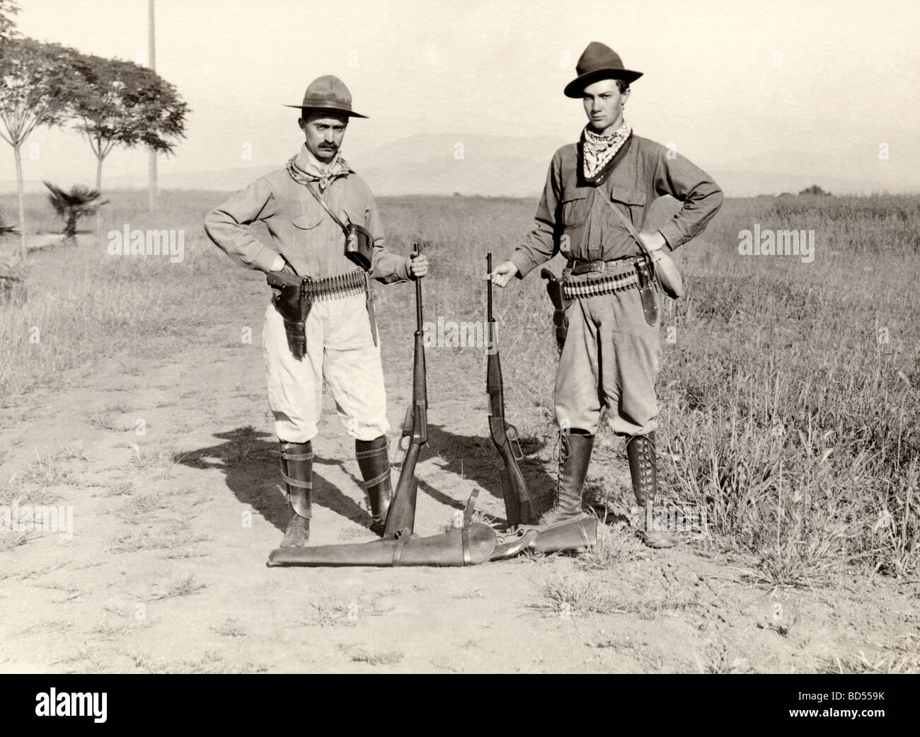 Two Well Armed Hunters on the Plains Stock Photo