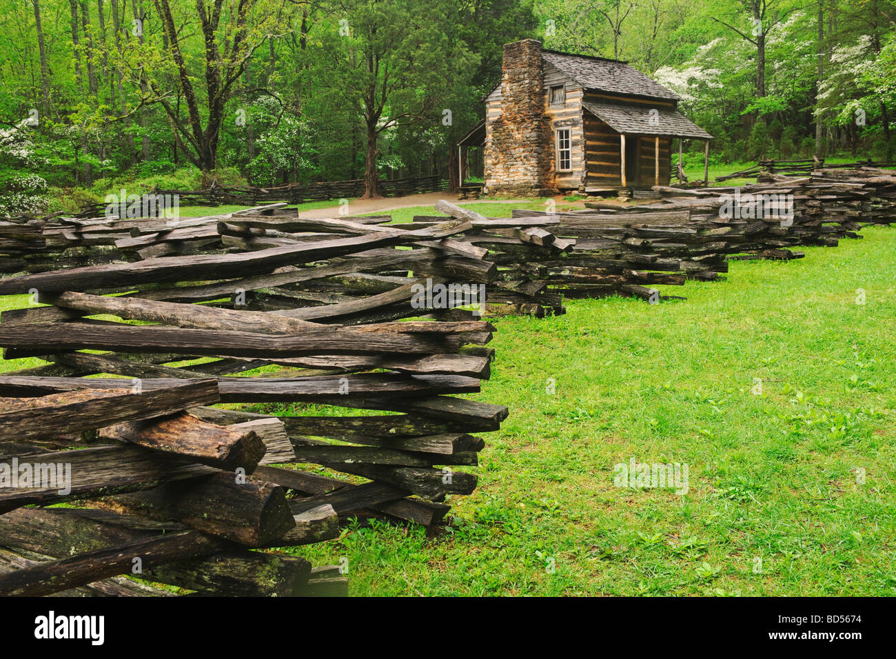 A fence and cabin in Smoky Mountain National Park Stock Photo