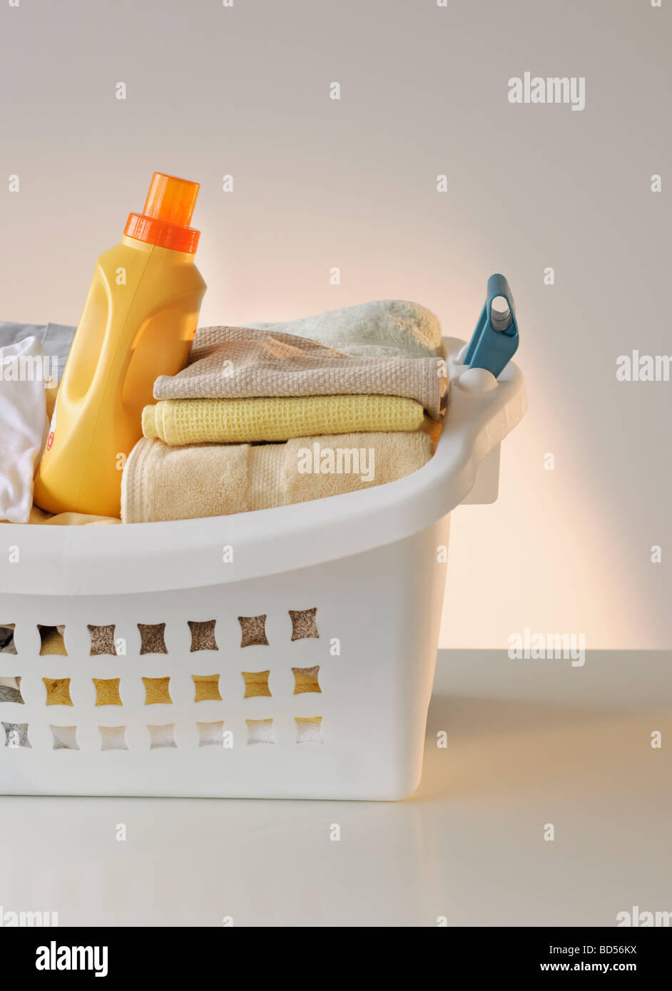 A laundry basket full of clothes Stock Photo Alamy