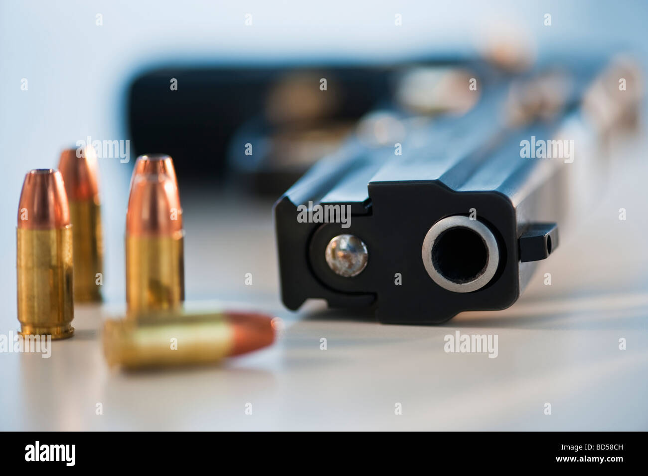 A handgun and ammunition Stock Photo - Alamy