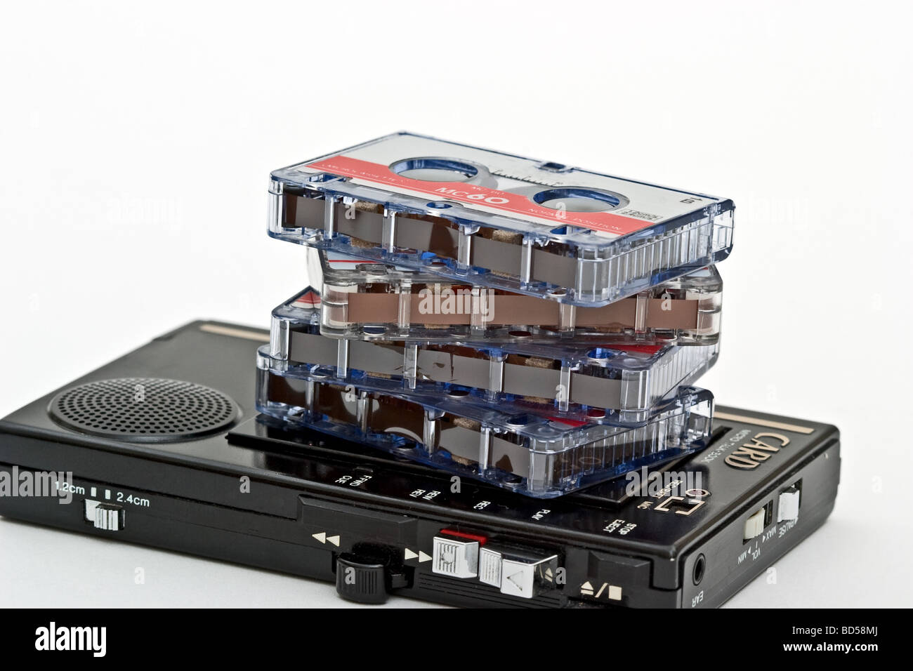 Small personal tape recorder with a pile of tapes on top Stock Photo