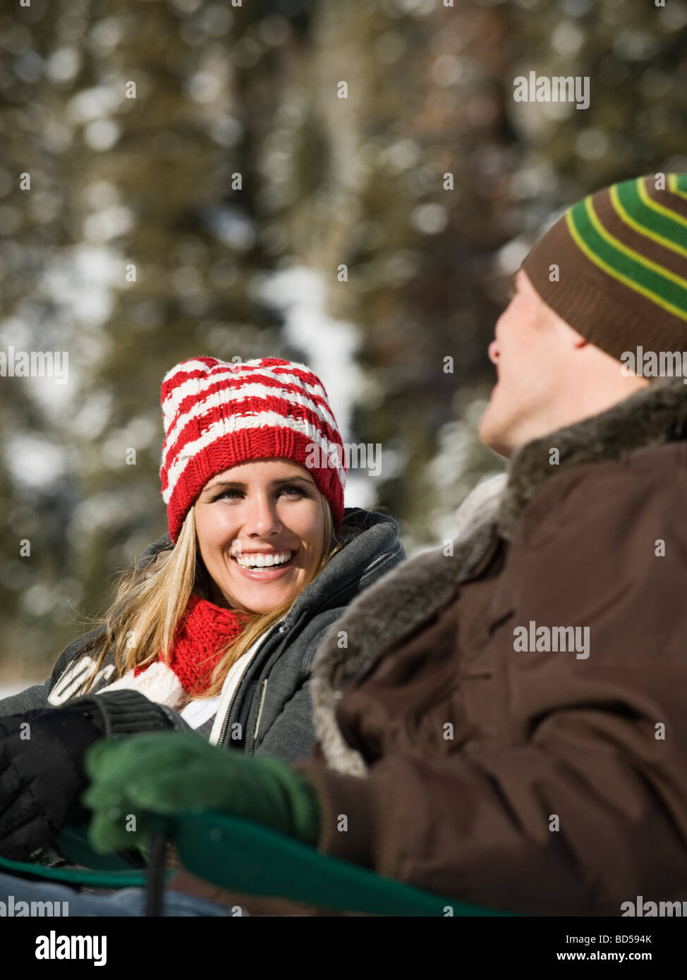 A couple outdoors in the snow Stock Photo