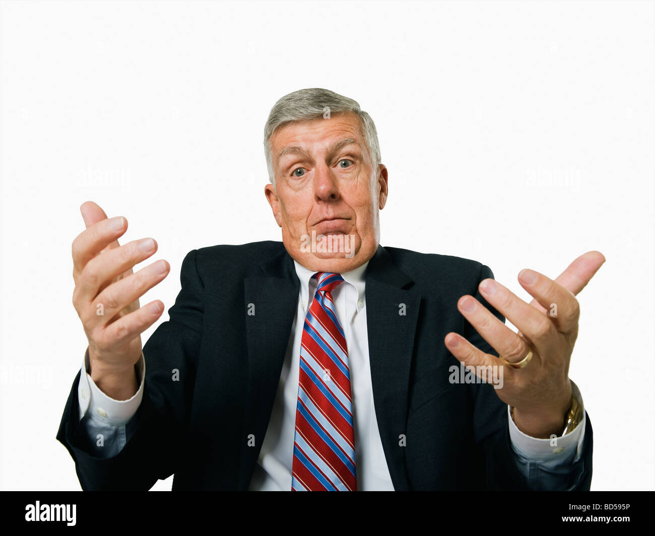 A businessman shrugging Stock Photo - Alamy