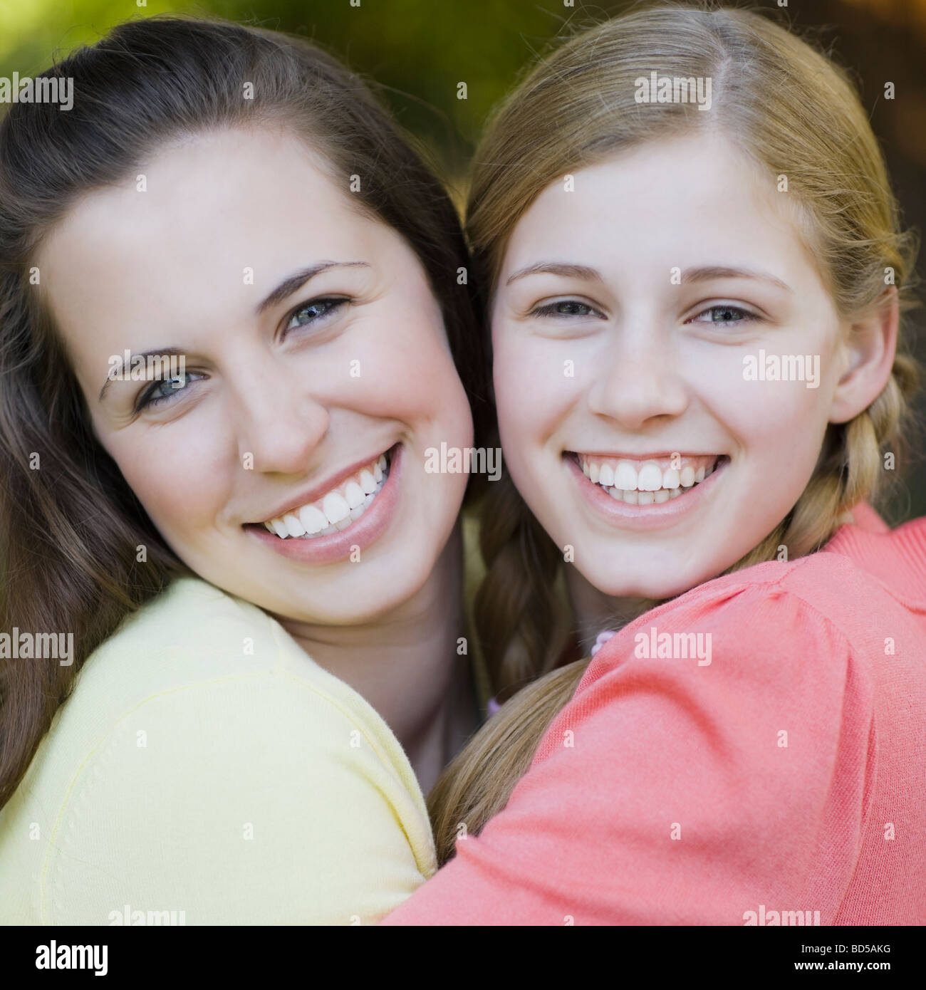 Two sisters outdoors Stock Photo Alamy