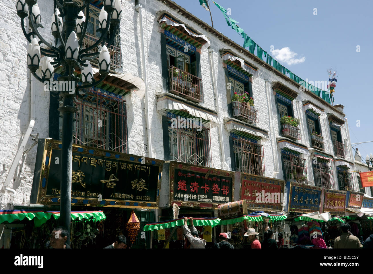 old tibetan houses used as shops on the barkhor circuit in lhasa Stock Photo