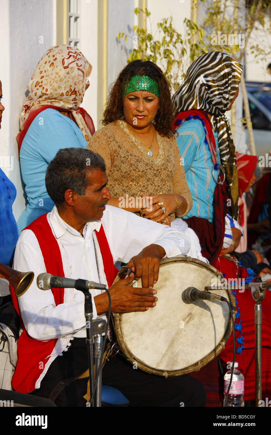 Man playing Bendir, frame drum, traditional Arabian music, Hammamet, Tunisia, Northern Africa Stock Photo