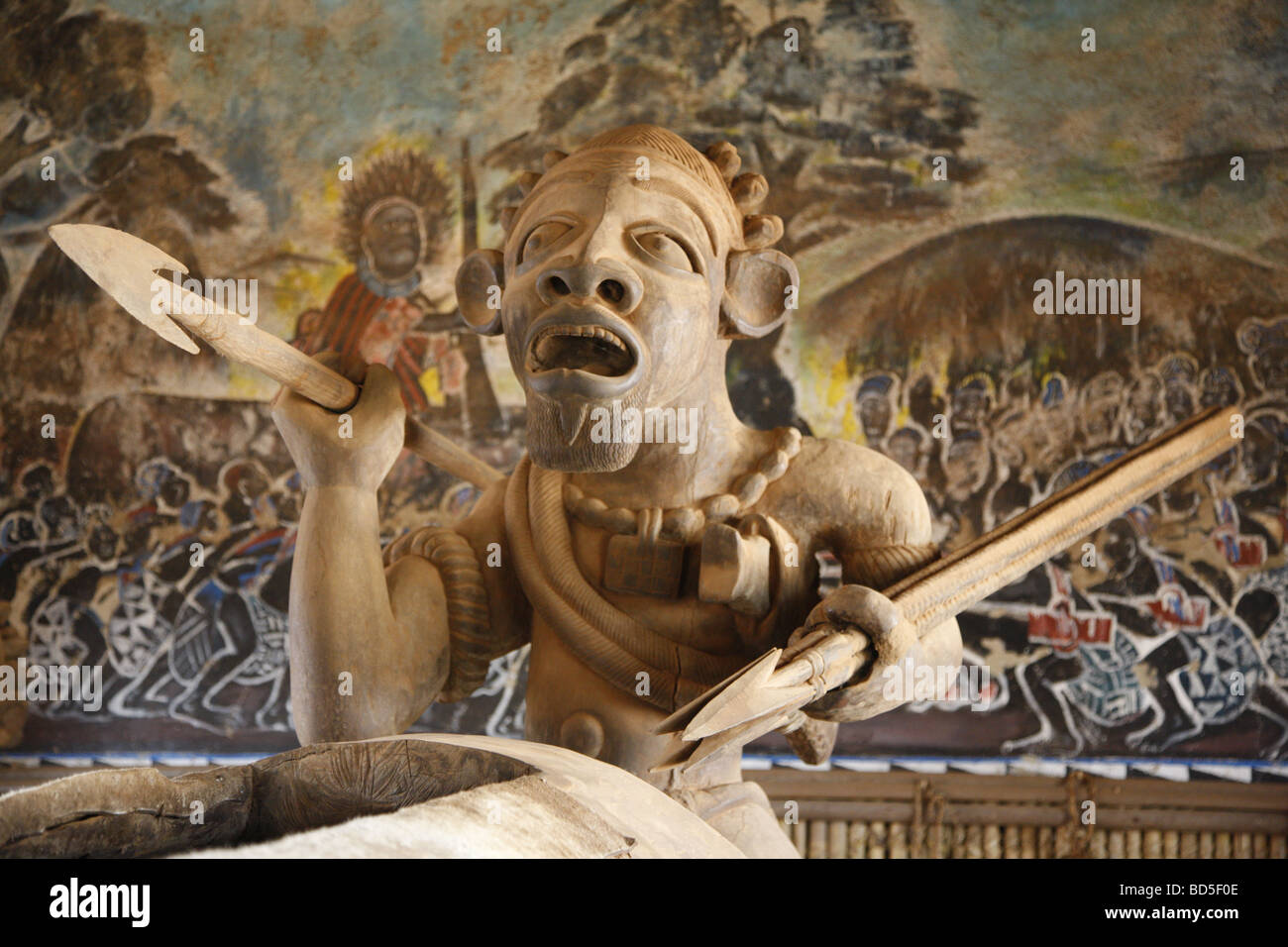 Woodcarved warrior in the Tam-Tam House, Foumban, Cameroon, Africa Stock Photo