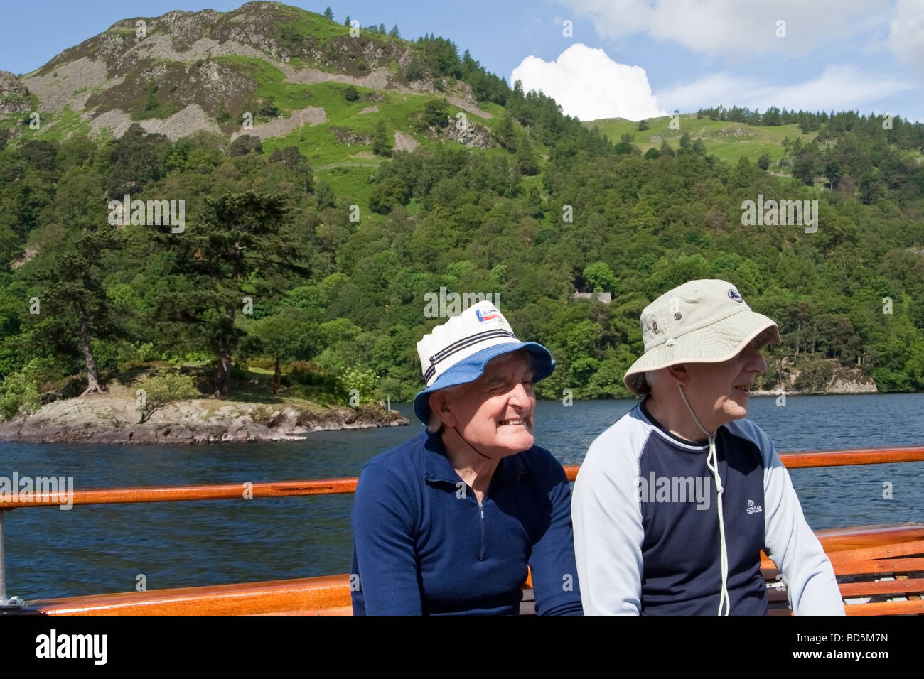 Passengers on a ferry on Ullswater, the Lake District, Cumbria, UK. Stock Photo
