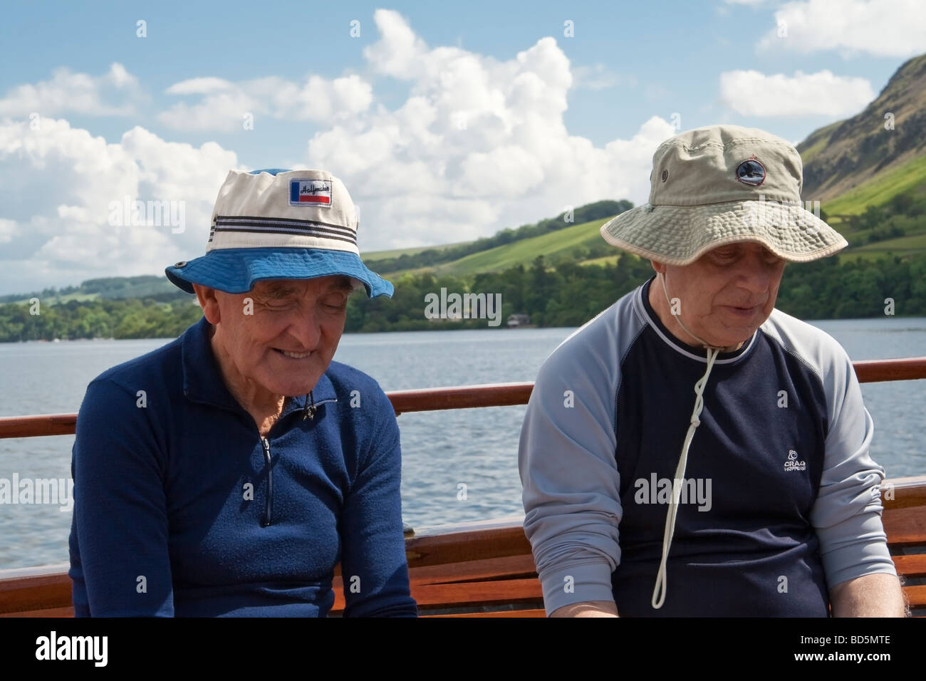 Passengers on a ferry on Ullswater, the Lake District, Cumbria, UK. Stock Photo