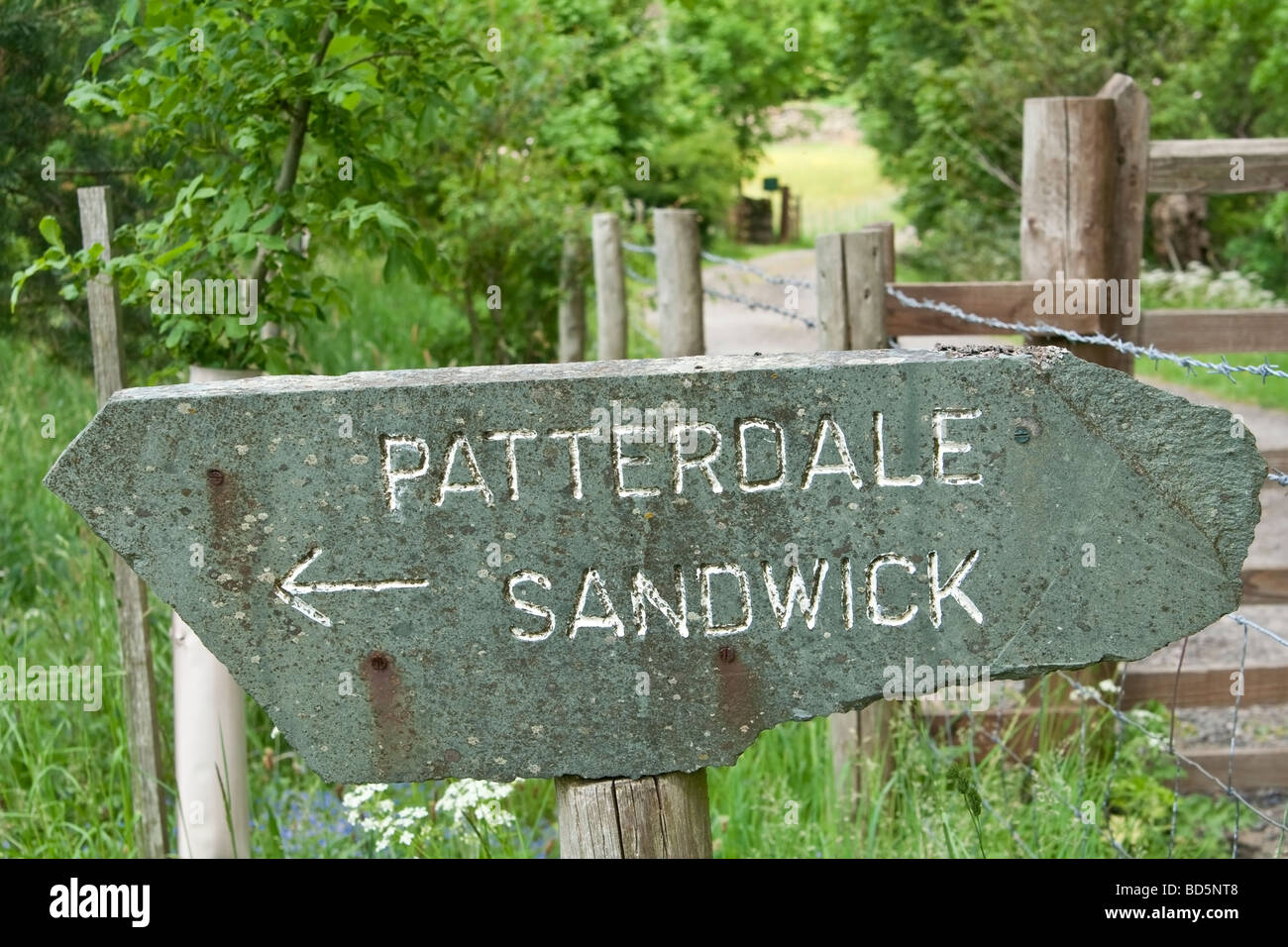 A slate sign to Patterdale and Sandwick, the Lake District, Cumbria, UK.. Stock Photo