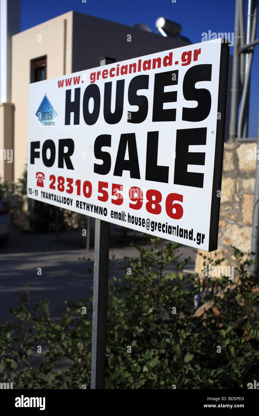 A Cretan Greek houses for sale sign in the village of Prines Stock