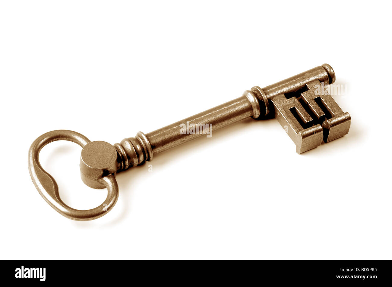 Vintage key isolated over a white background Stock Photo - Alamy