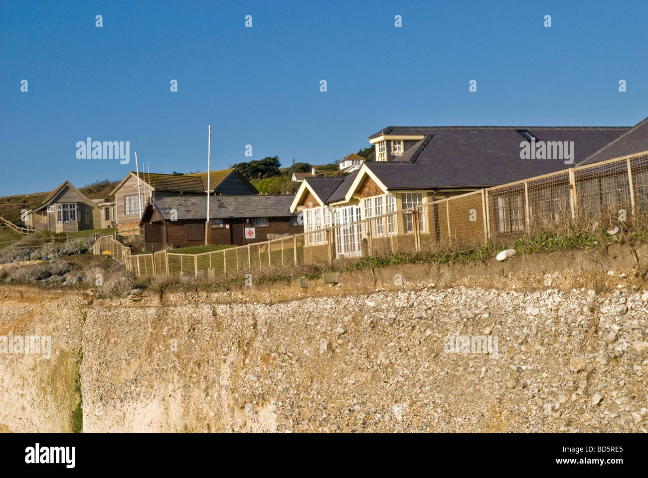 THE HOUSES ON THE EDGE OF HILL IN A DANGER OF LANDSLIDE Stock Photo