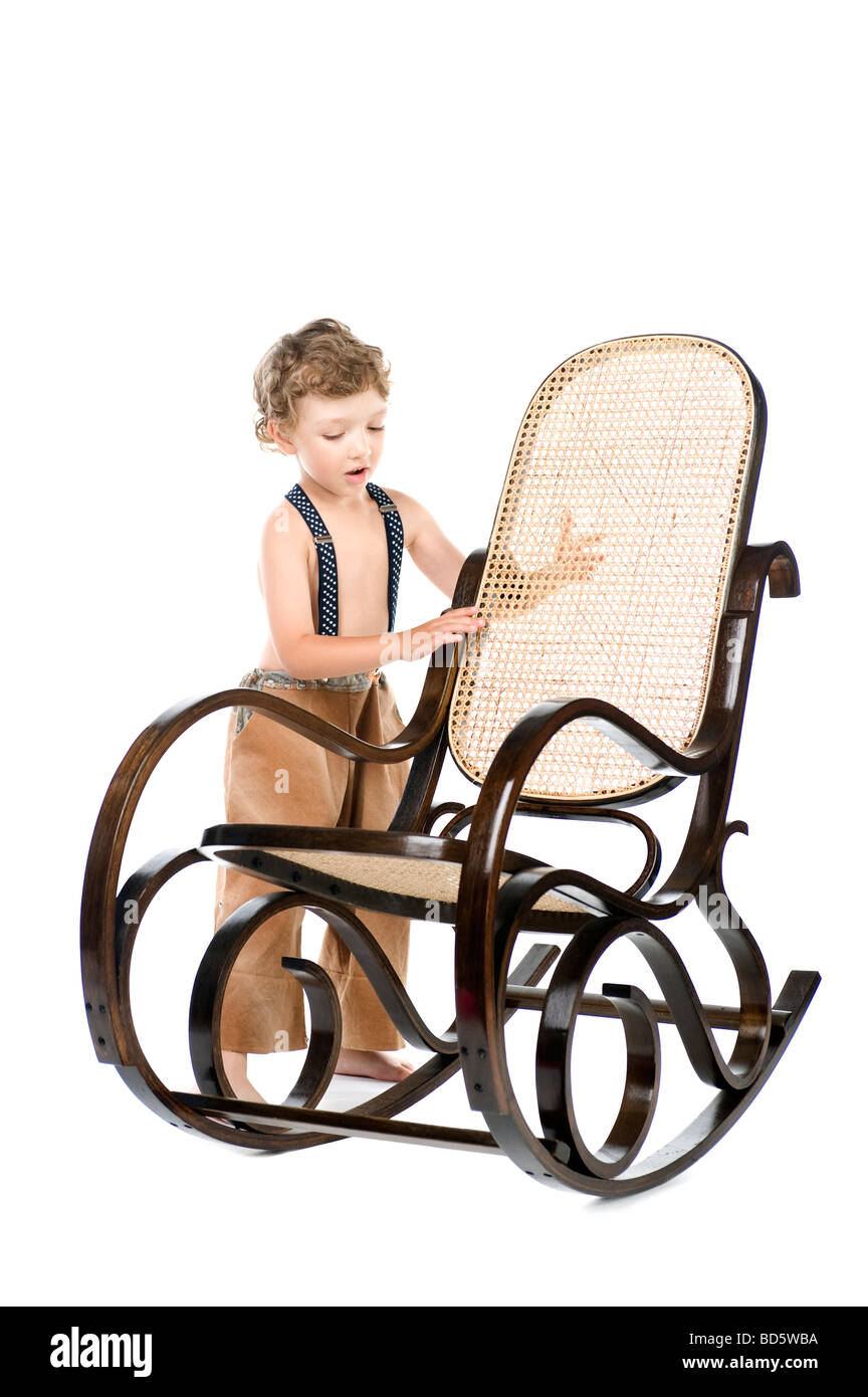 object on white Portrait Boy and rocking chair Stock Photo