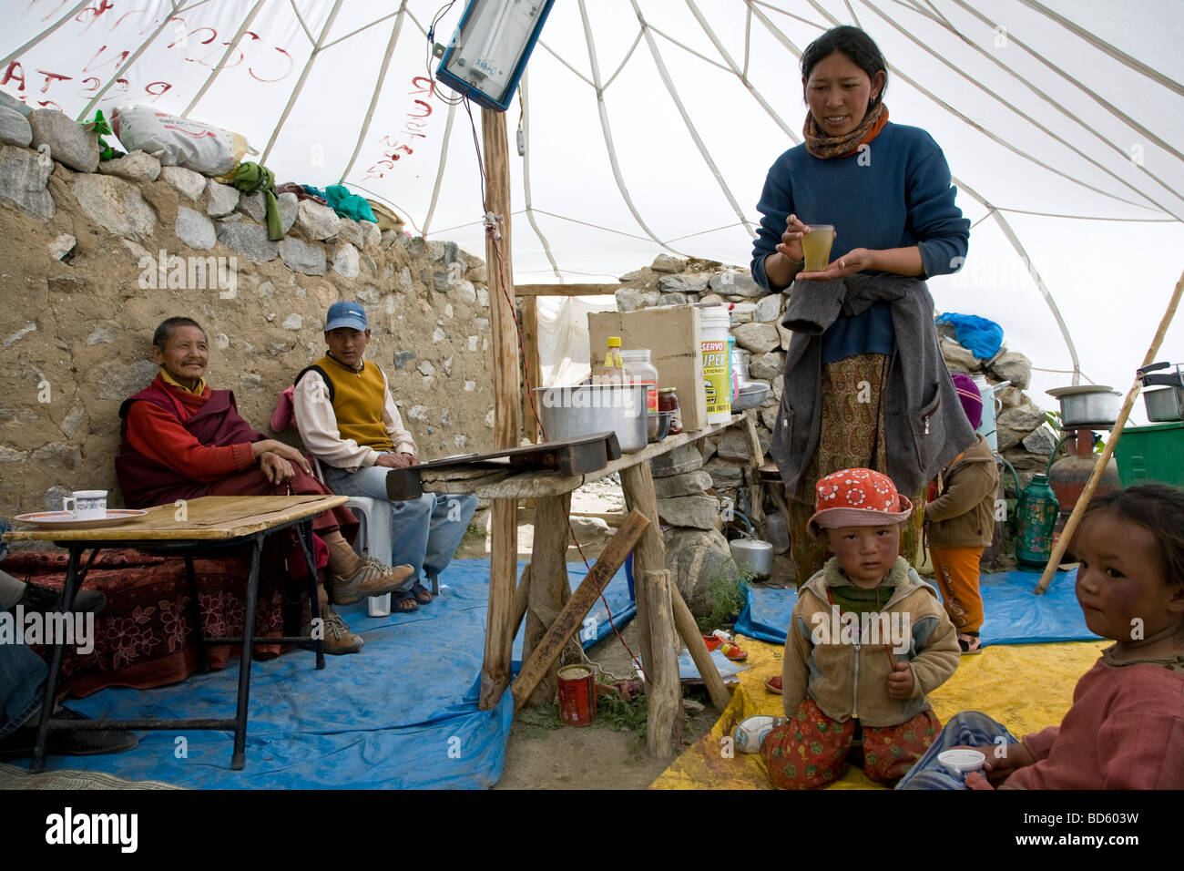 Ladakhi family in their traditional tent. Spangmik. Ladakh. India Stock Photo