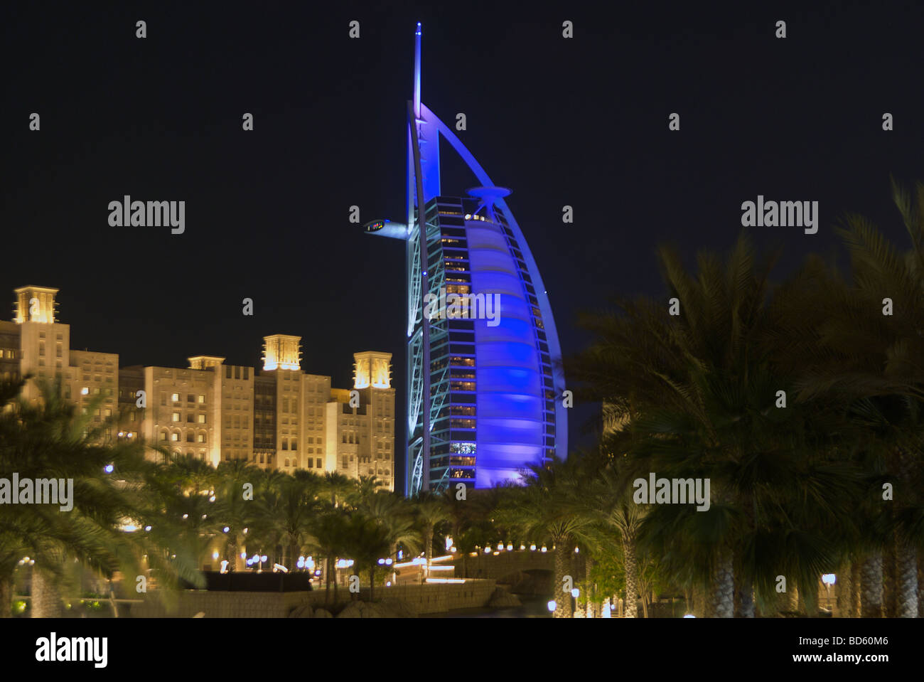 View to the Burj Al Arab hotel from the Madinat Jumeirah luxury resort, Jumeirah, Dubai, United Arab Emirates (UAE) at night Stock Photo