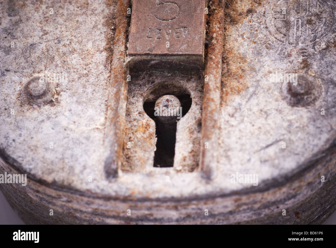CLose up of a keyhole in an old rusty lock Stock Photo