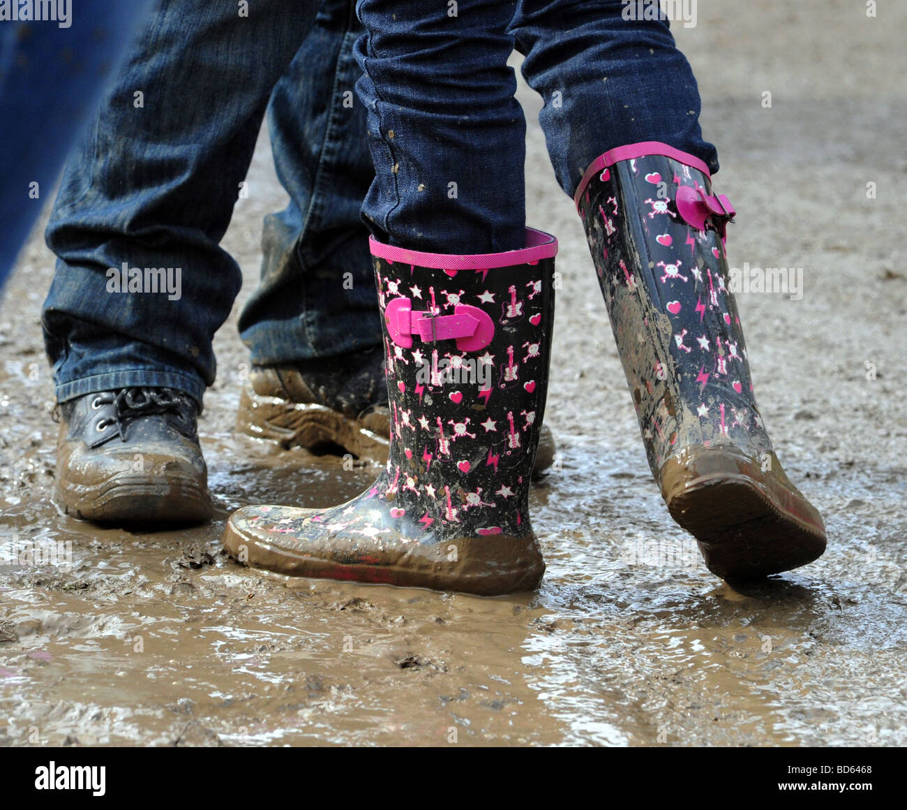 A couple wearing muddy boots and Wellingtons Royal Welsh Show 2009 Stock Photo