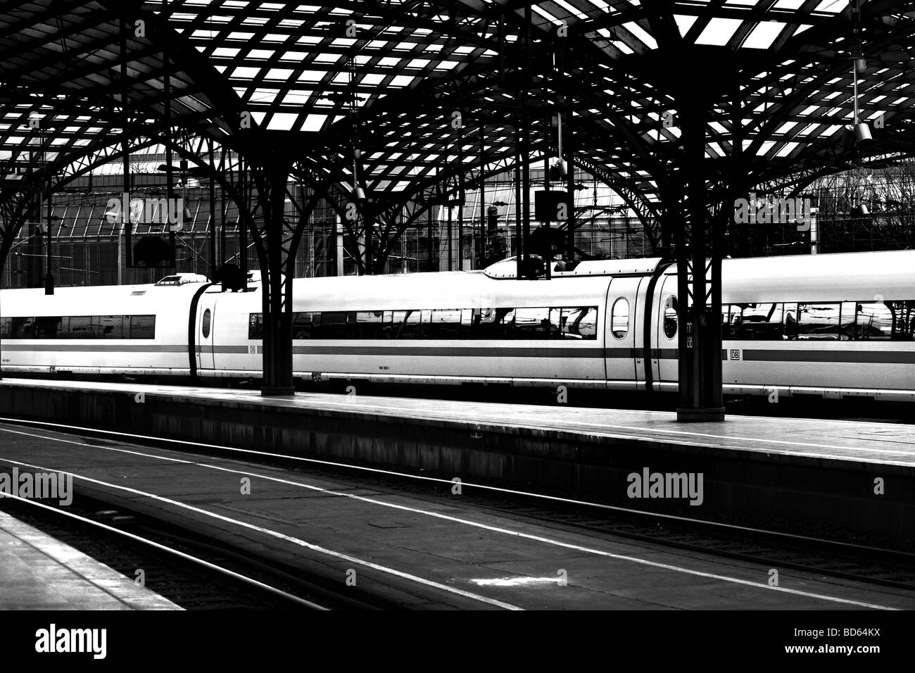 Passenger train at the railway station of Cologne Germany Stock Photo