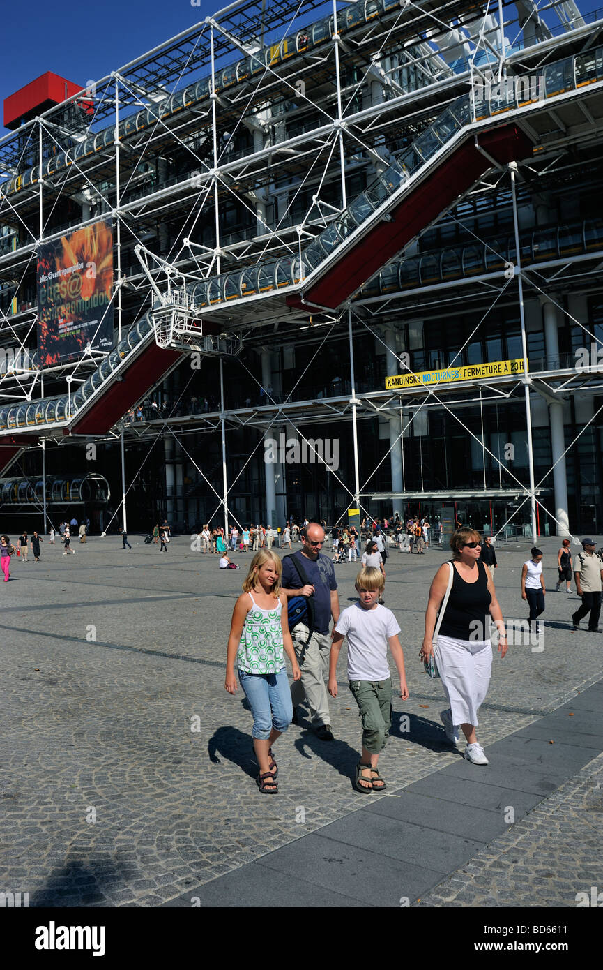 Paris France, Tourist Family, With Children, Walking, Outside of "Centre George Pompidou Museum" Beaubourg Plaza Stock Photo