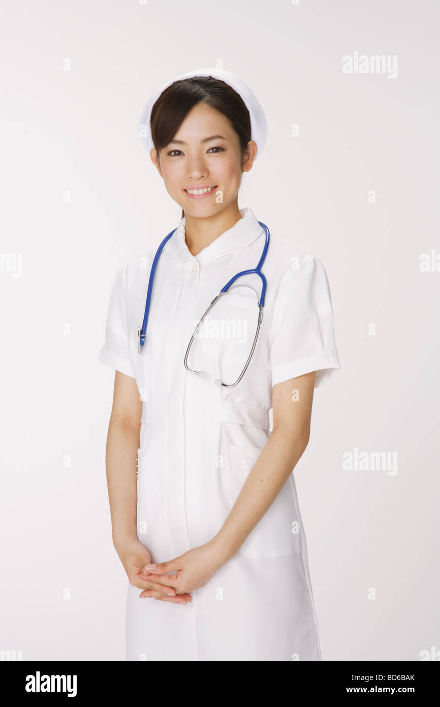 Young japanese pretty smiling nurse hi-res stock photography and images ...