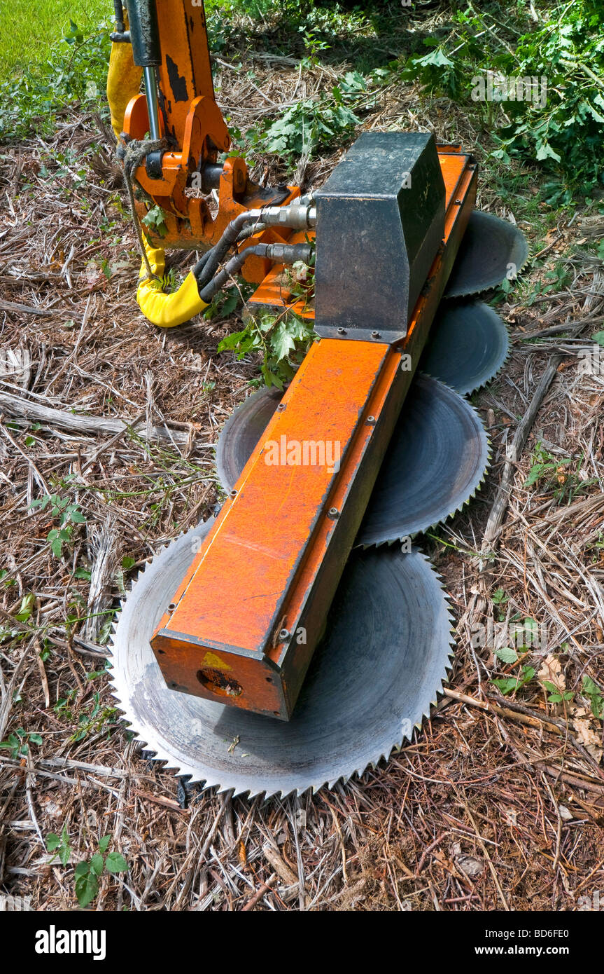 Tractor mounted "Noremat" 4-bladed circular saw for cutting tree branches -  France Stock Photo - Alamy