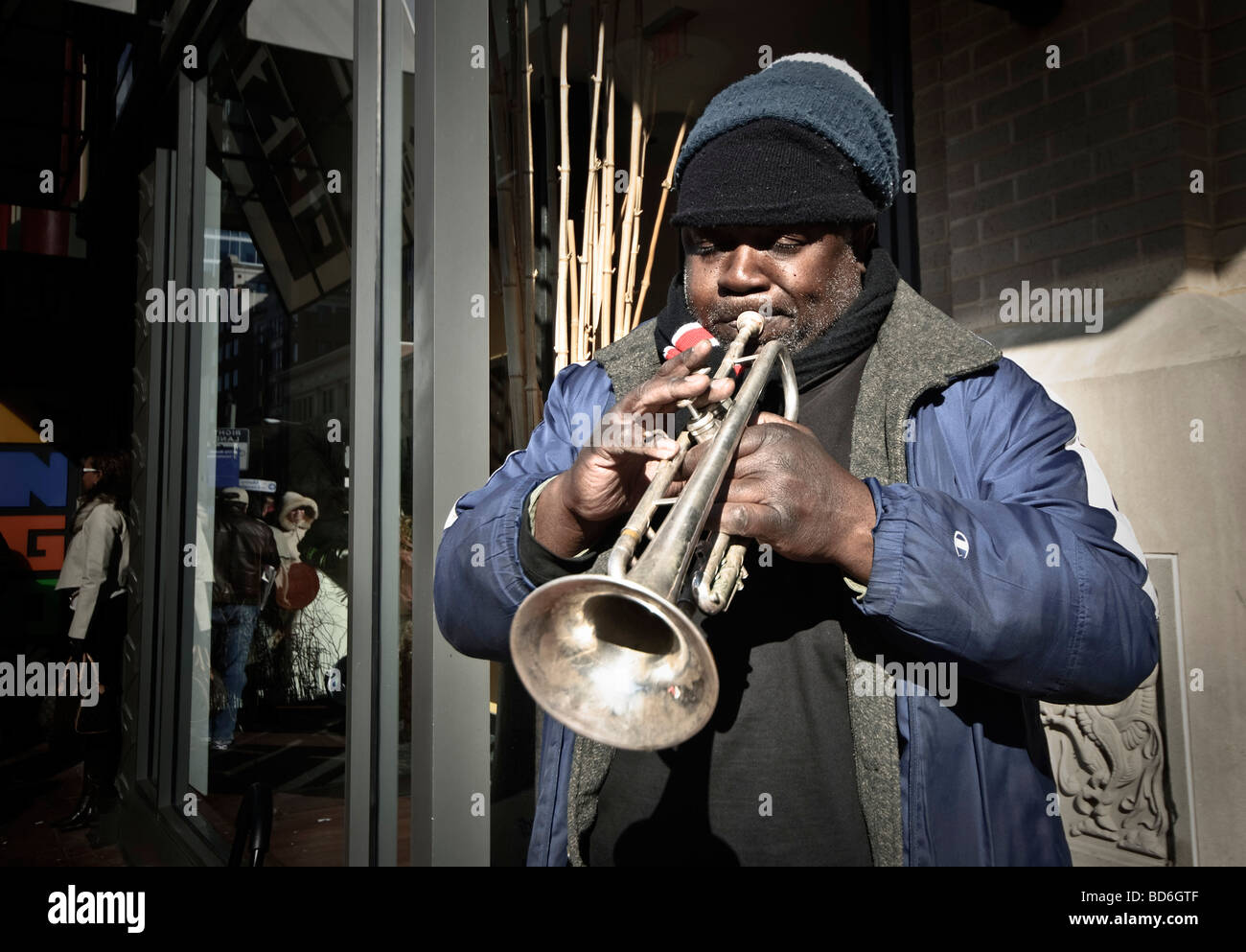 WASHINGTON DC, USA - Jazz trumpeter busking on the street at the Chinese New Year Parade in downtown Washington, DC, in Chinatown Stock Photo