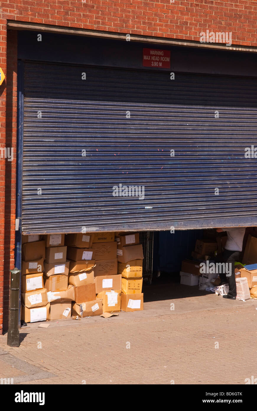A shop store trade entrance to warehouse full of goods in boxes in