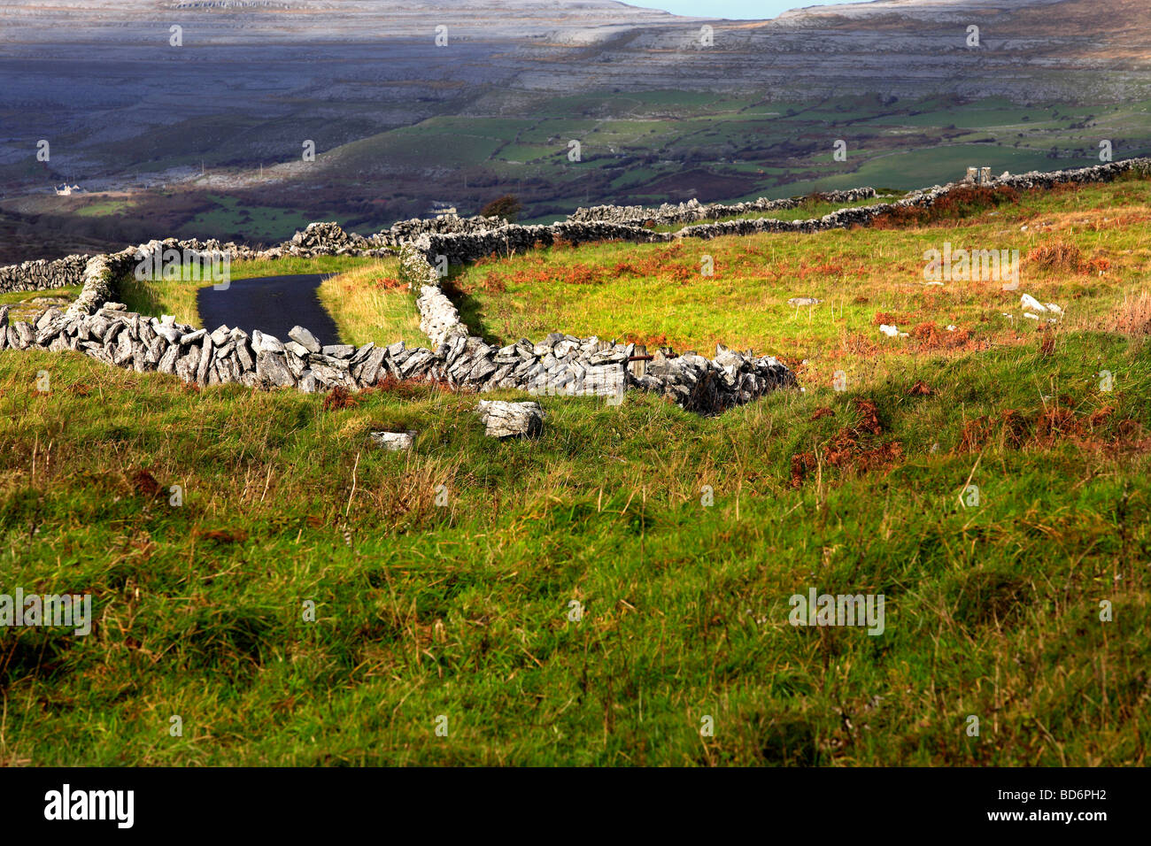 Stone Walls and Roadway Ireland Stock Photo