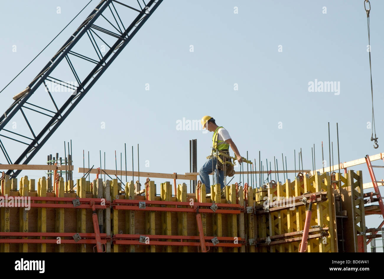 construction worker assembling forms for a concrete wall Stock Photo
