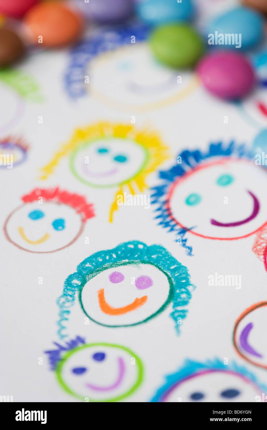 https://c8.alamy.com/comp/BD6YGN/childs-coloured-drawing-of-happy-smiling-faces-with-smarties-BD6YGN.jpg
