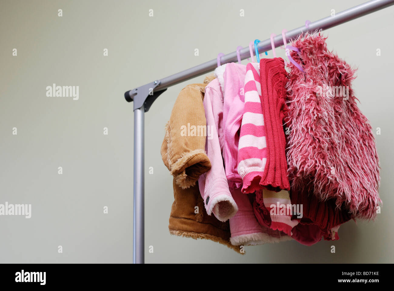 Clothes rail bedroom hi res stock photography and images Alamy