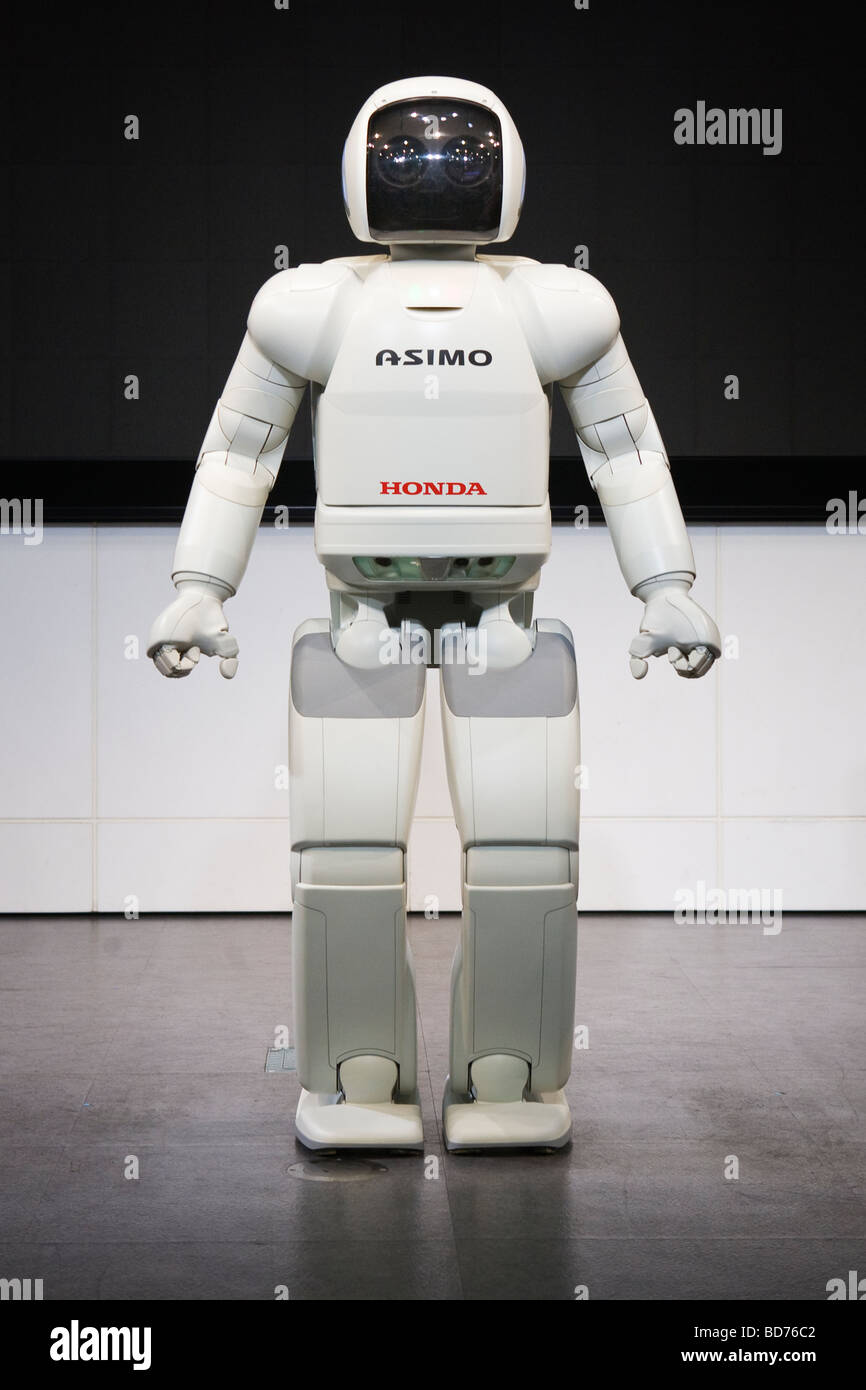 Asimo a humanoid robot created by Honda giving a performance on stage at the company headquarters in Tokyo Stock Photo