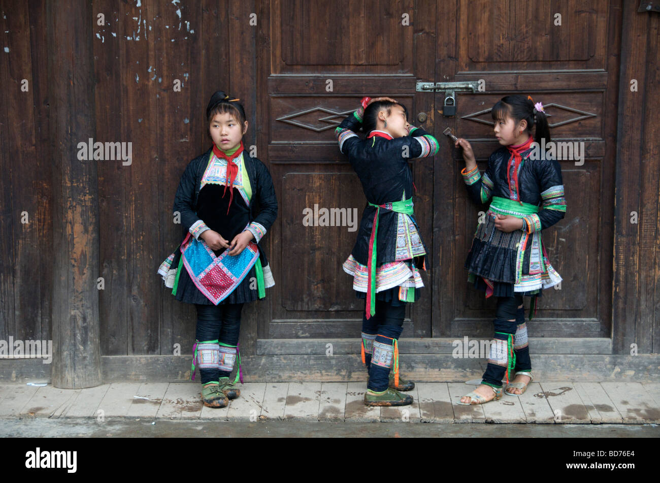 Three Basha Miao schoolgirls Congjiang County Guizhou Province China Stock Photo