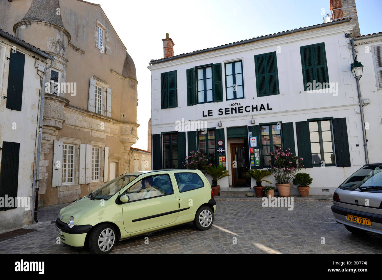 Ars en Re Hotel Le Senechal green shutters car Stock Photo