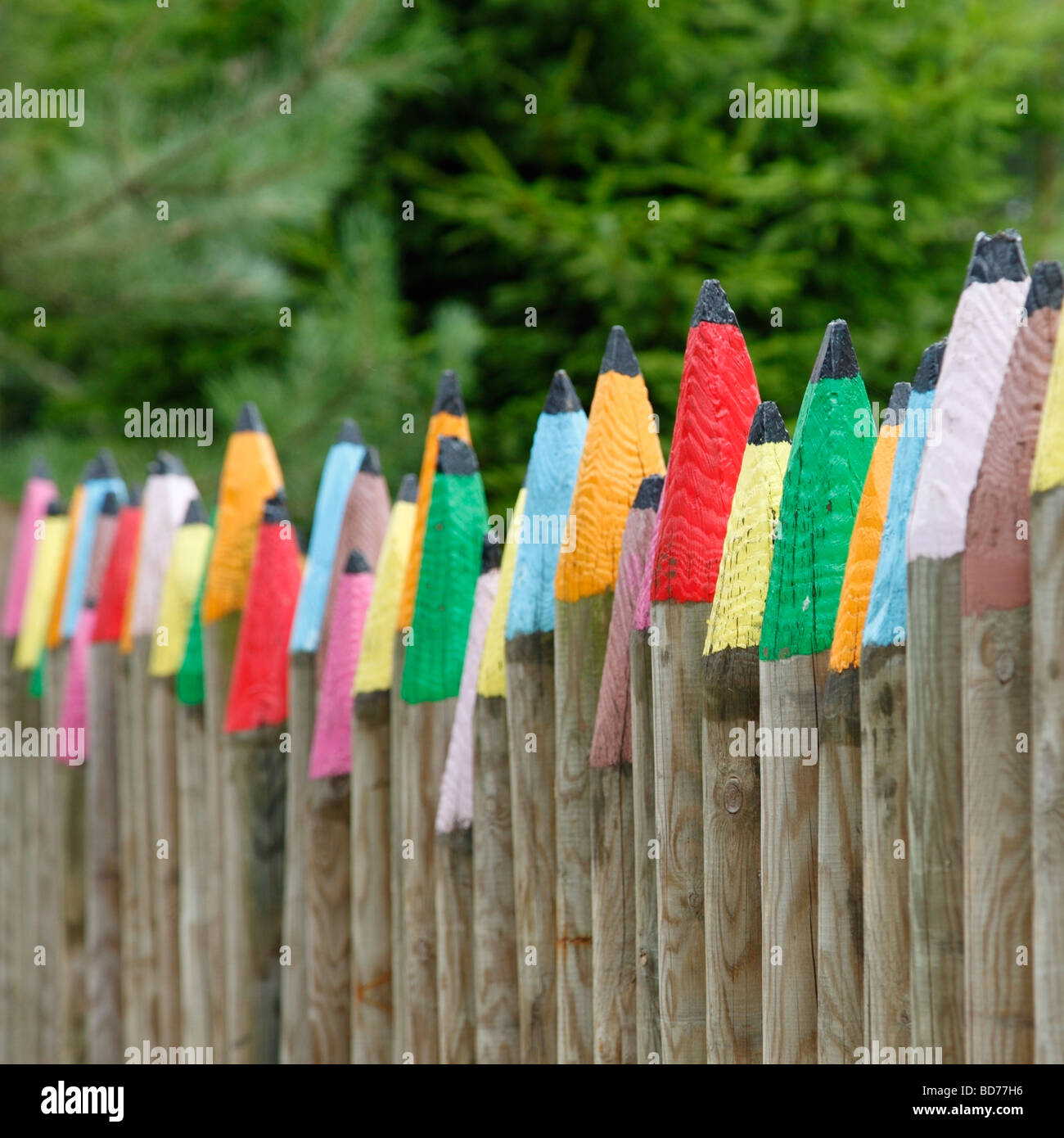 Pencil fence surrounding a childrens creche. Center Parcs, Sherwood Forest, Nottinghamshire, England, UK. Stock Photo