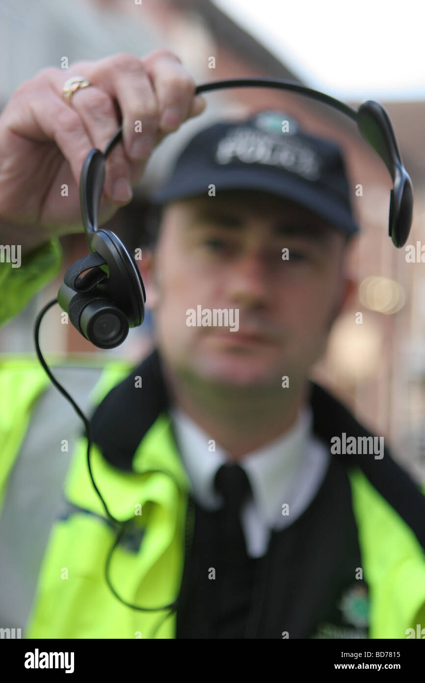 A British police officer with a head camera Stock Photo