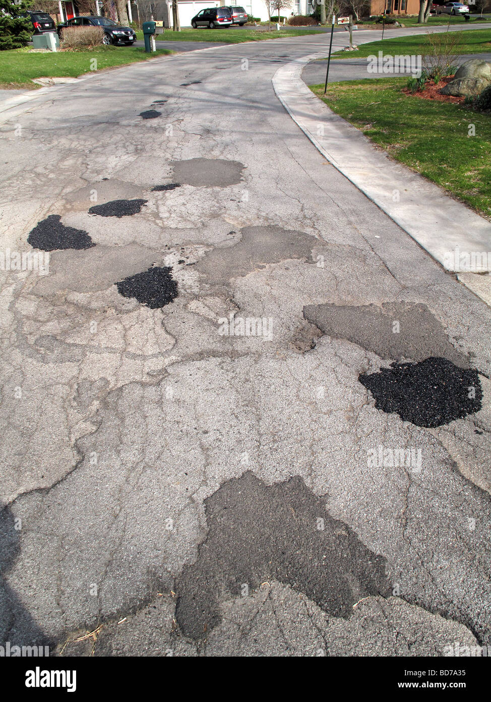 Dangerous potholes on street Stock Photo Alamy